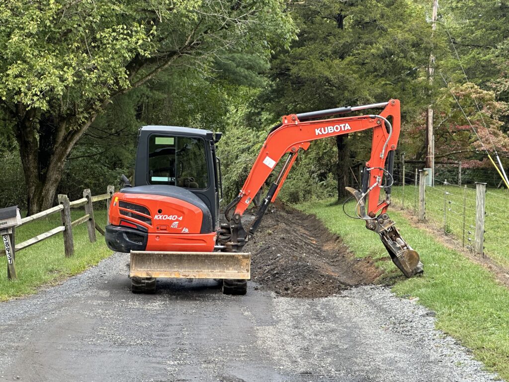 gravel road repair and drainage system