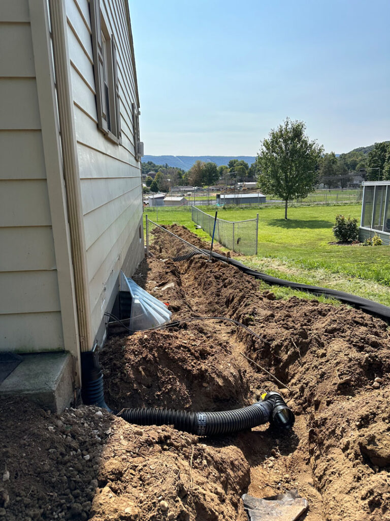 We installed a French drain approximately 10 feet away from the home.