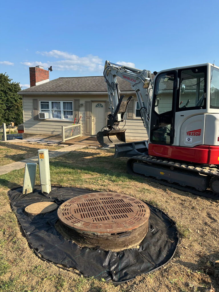 River rock was placed near the home and over the drain to create an appealing look.