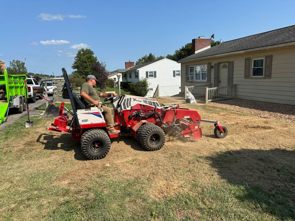 The lawn area was power-raked to a smooth finish.