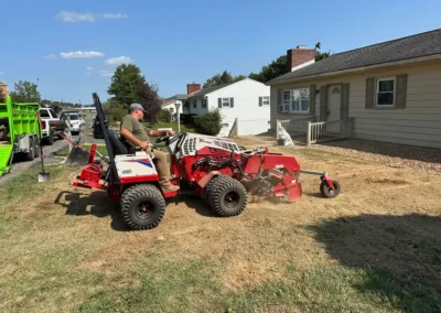 Power rake lawn grading prep