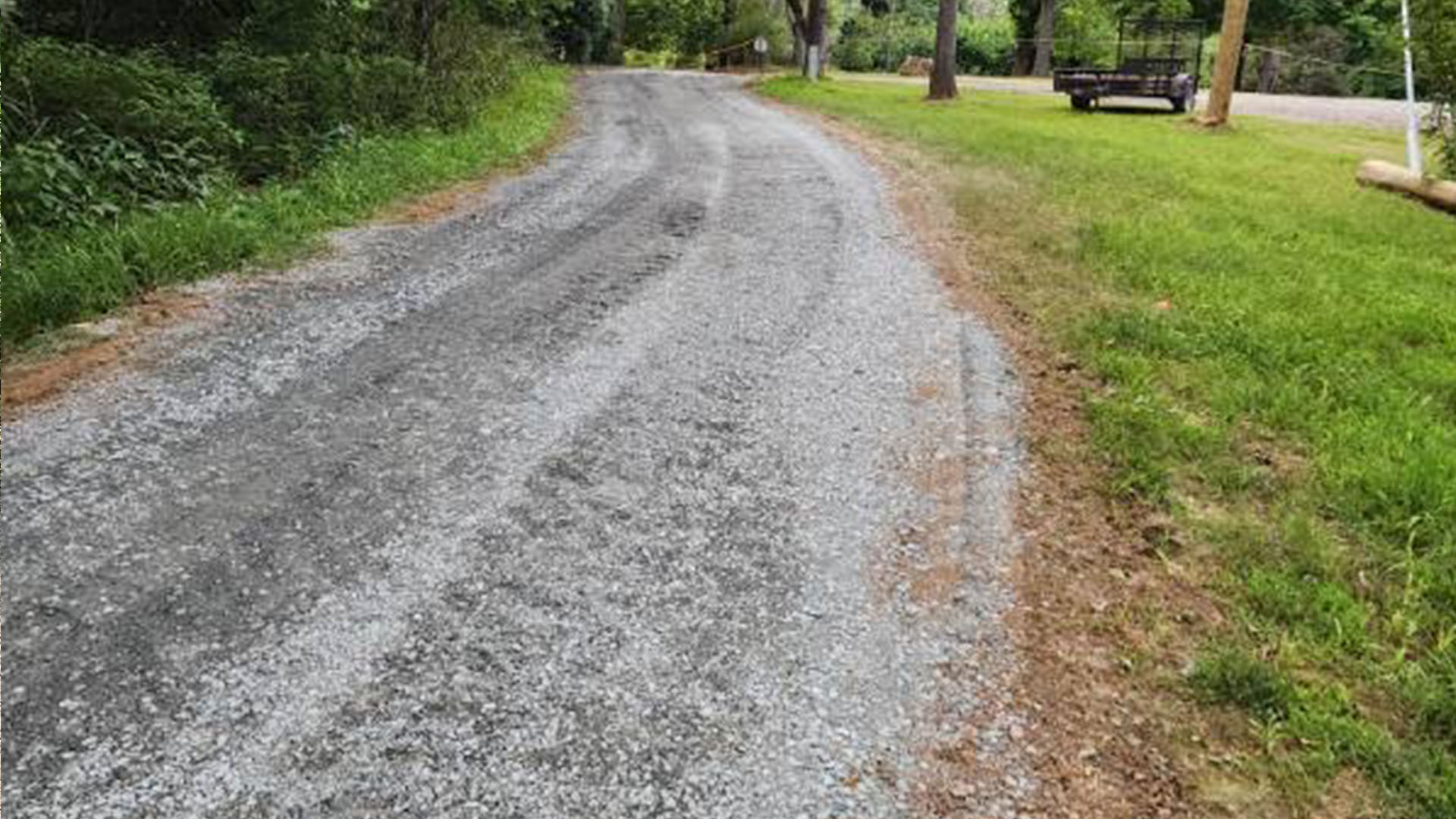 Stable, well-graded gravel access road providing reliable access