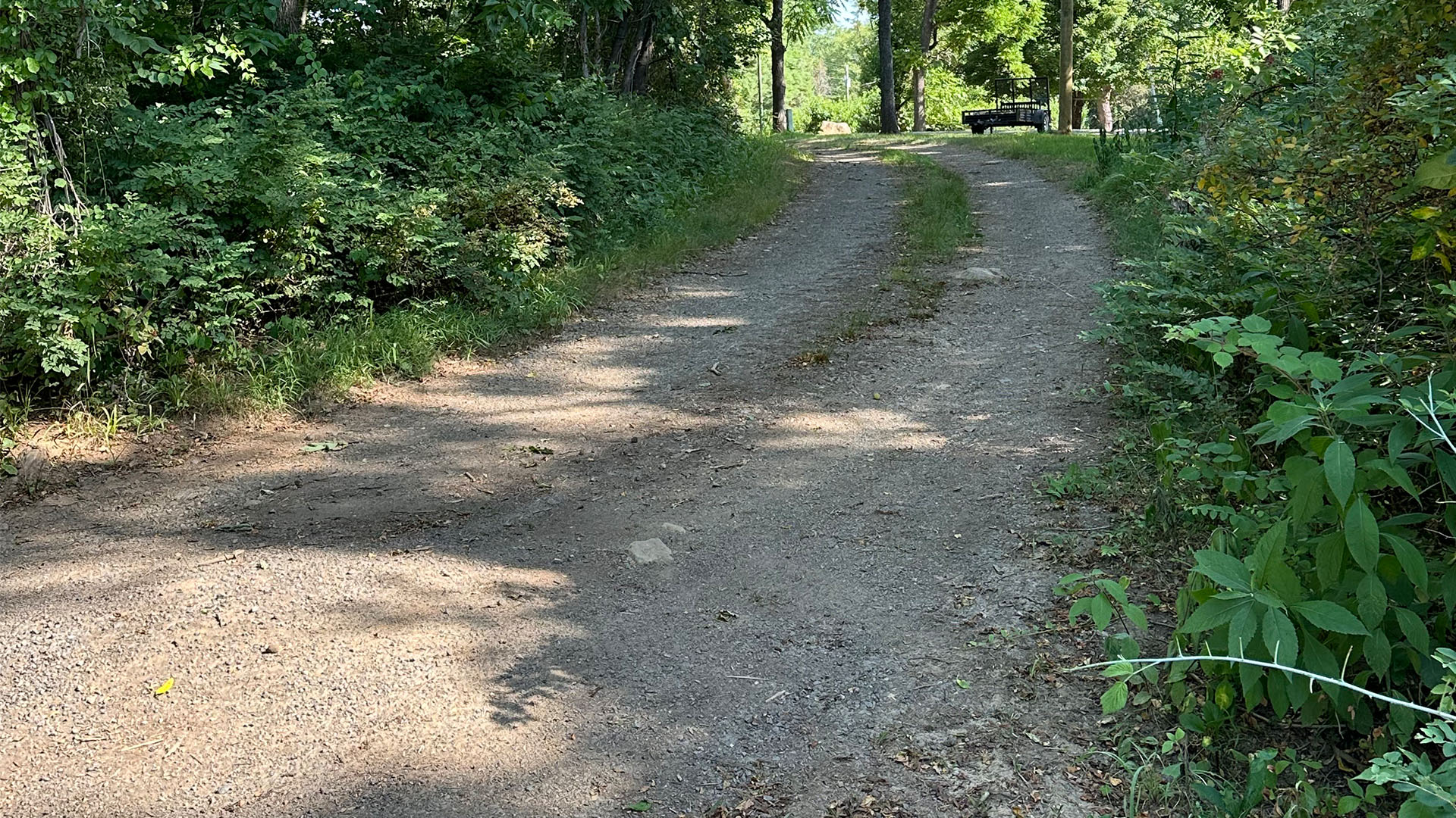 Uneven access road before gravel installation